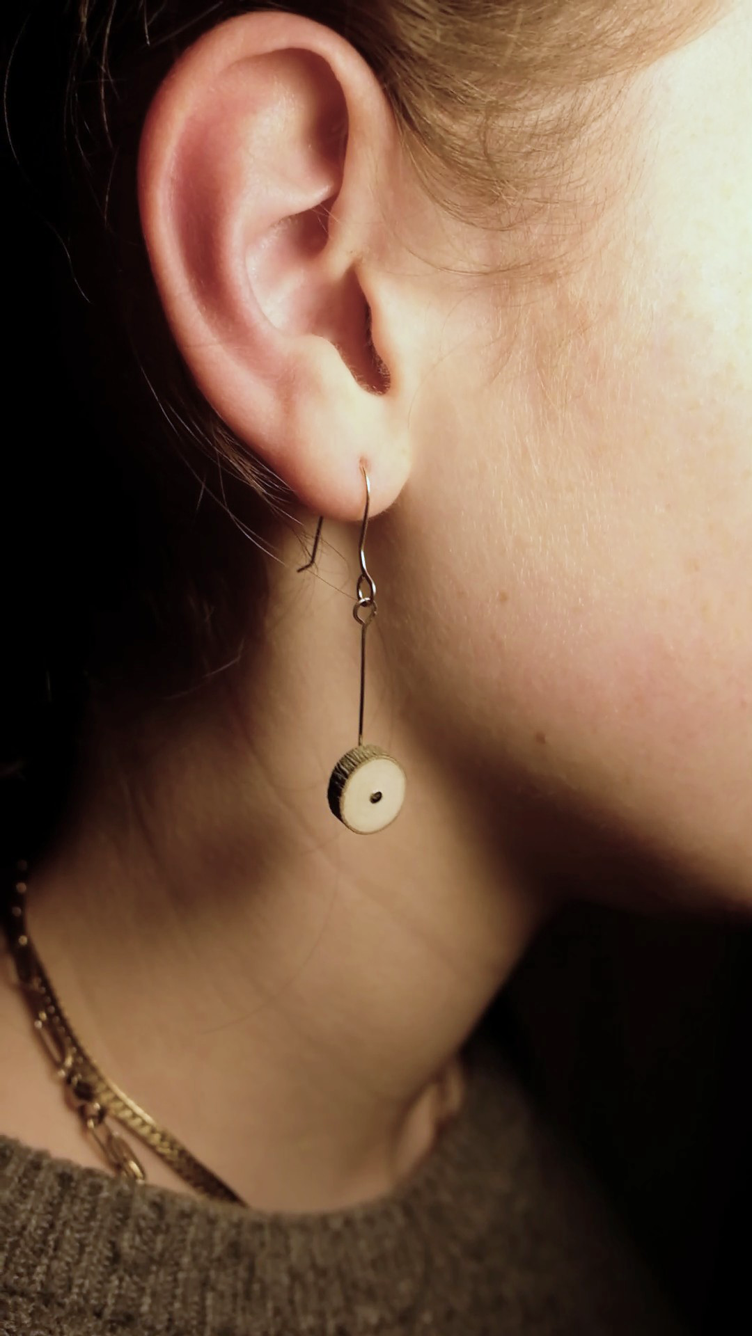 Disc No.01 worn on ear